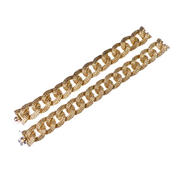 Pair of gold woven curblink bracelets, longer and shorter lengths forming a collar necklace